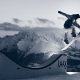 Laax Snowboarder Sprung über Schanze